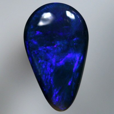 SOLID BLACK OPAL Royal blue moving in rollling flashes
